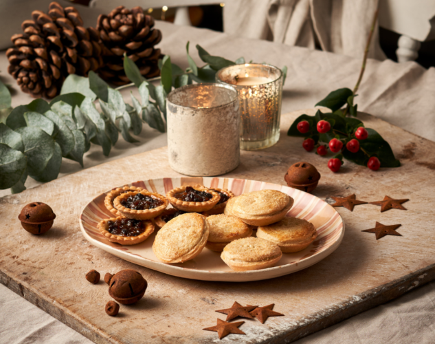 Freshly baked mince pies and tarts on plate